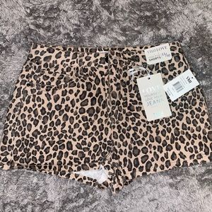 Leopard denim shorts.